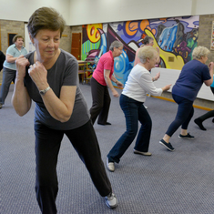 Older ladies take part in tai chi