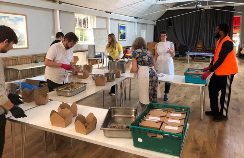 Food boxes being prepared by volunteers
