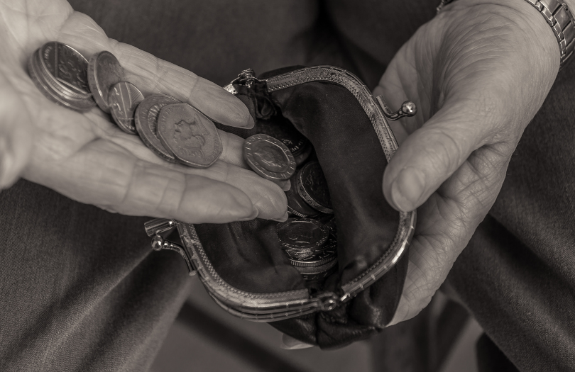 cost of living (810 × 525px) open purse with coins