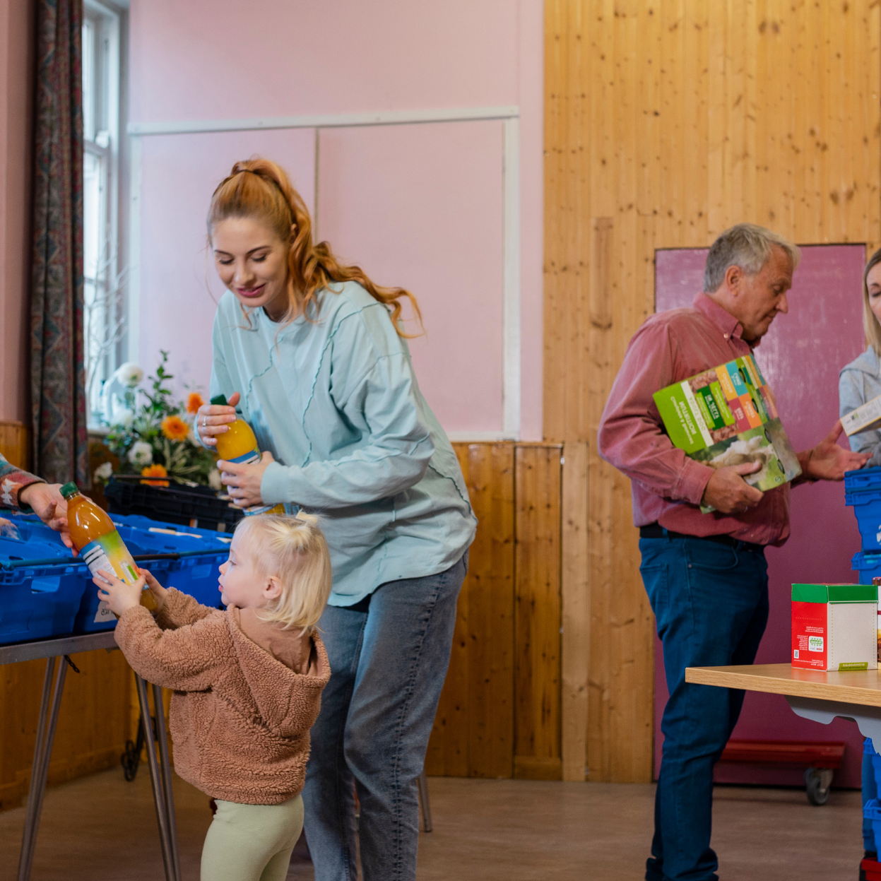 Living Essentials Fund (2) Woman and young child visiting a food bank