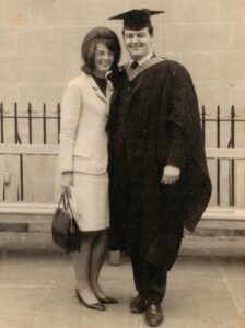 Black and white photo of Bob and Alison graduating