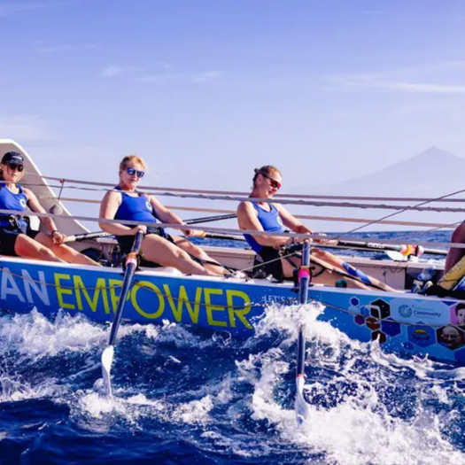 Ocean Empower Fund news story 810×525 4 women in the sea rowing in an ocean-worthy rowing boat
