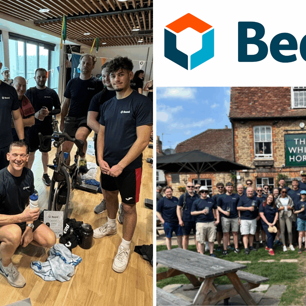 A group of people in a gym gathered around someone on a bicycle. A large group of people in sports clothes gathered outside a pub.