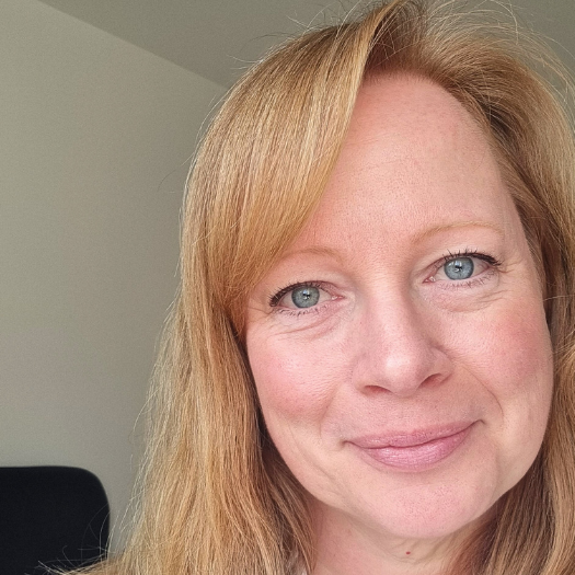 Naomi Lyons smiling at the camera.