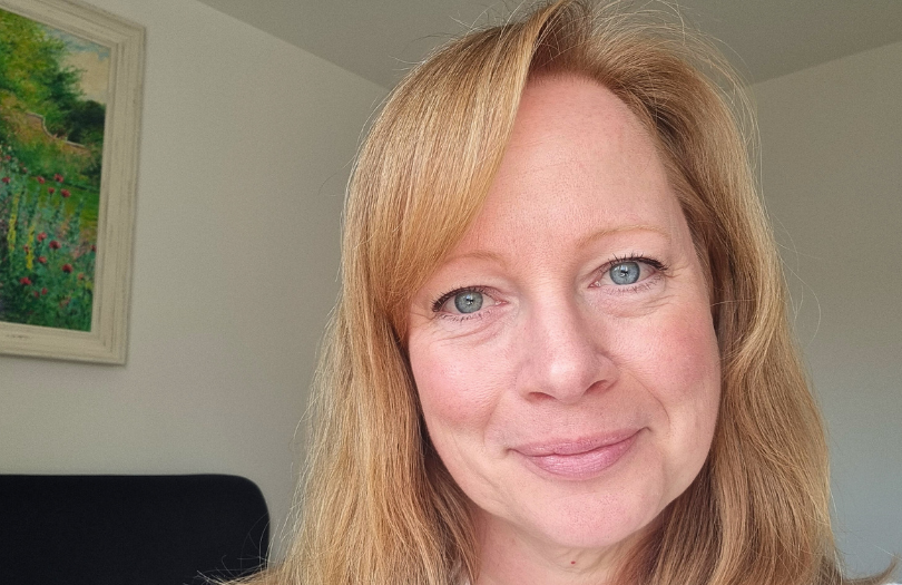 Naomi Lyons smiling at the camera.