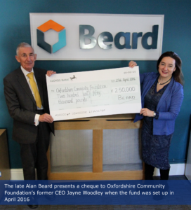 The late Alan Beard presenting a cheque for £250,000 to OCF's former CEO, Jane Woodley, when the fund was set up in 2016.